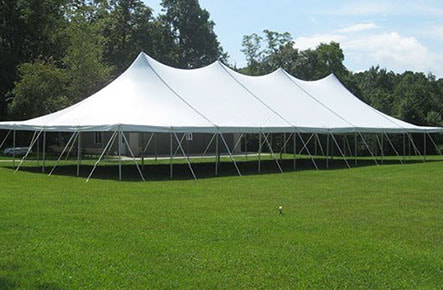 40-foot by 100-foot pole tent with white canopy