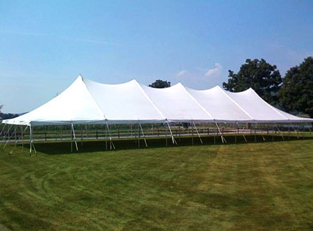 40-foot by 120-foot pole tent with white canopy