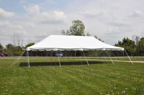 20 foot by 40 foot pole tent with white canopy