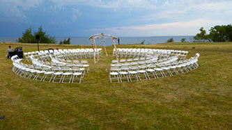 chairs set up in circles for an outdoor ceremony