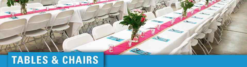 banquet tables and chairs with elegant white tablecloths
